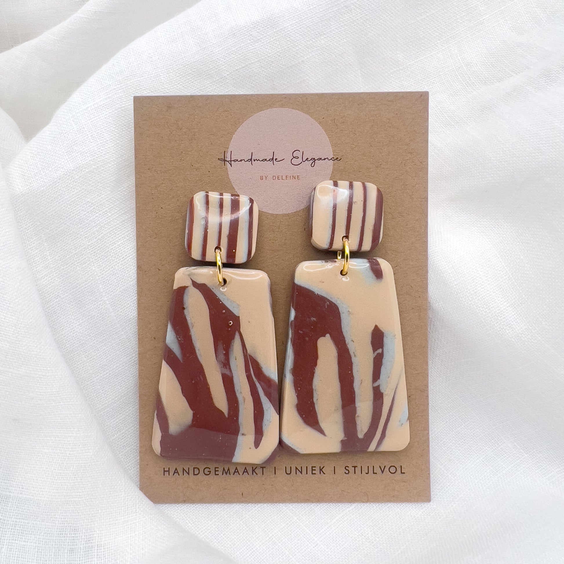 Unieke handgemaakte herfstkleurige polymeerklei oorbel kopen bij Handmade Elegance by Delfine